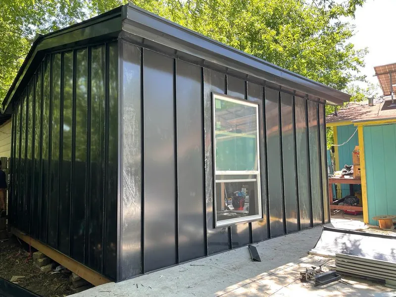 Black standing seam metal wall panels for Metal Roof Installation in North Greenbush