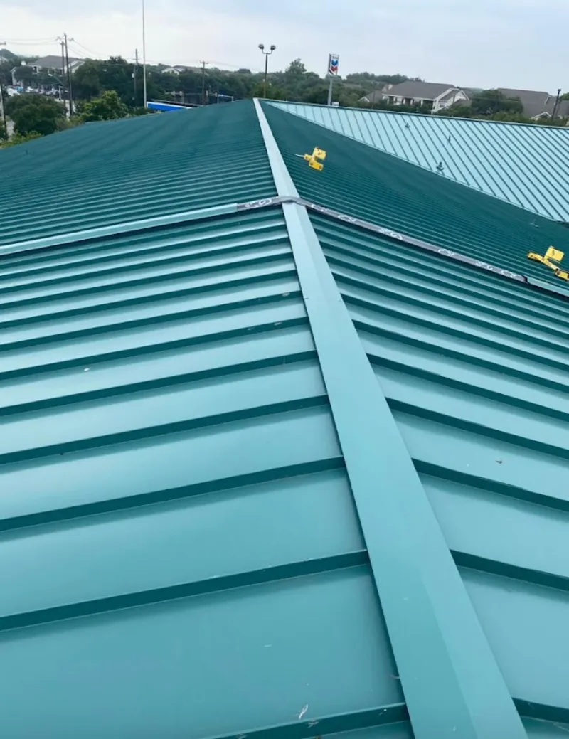 Green commercial metal roof ridge and valley for Metal Roof Repair in North Greenbush